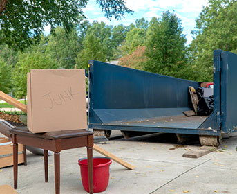 Roll Off Dumpster for Furniture Disposal in Driveway